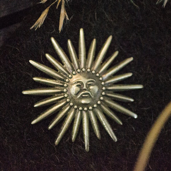 Pilgrim's Badge with Sun with human face