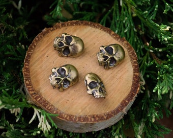 Buttons skull shaped (4 pieces set)