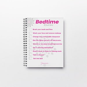 May include: A white spiral bound notebook with a pink and gray design. The cover has the text "Bedtime Routine" and a checklist of activities to do before bed, including brushing teeth, washing face, changing into pajamas, dimming lights, stretching, setting a relaxing atmosphere, reading, taking a shower, and getting into bed.