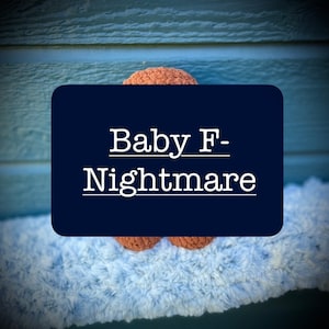 May include: A close-up of a pair of brown crocheted baby booties on a blue fuzzy surface. The text "Baby F-Nightmare" is written in white on a dark blue rectangle.