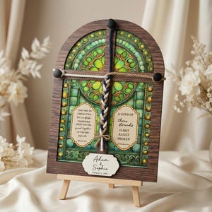 May include: A white ceramic mug with a black handle and the text "But First, Coffee" in a black, handwritten-style font. The mug is on a white surface.