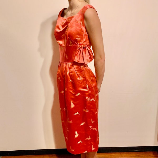 Vintage 1950s Hand Tailored Orange Satin Dress with Gold Japanese Iconography is in excellent condition.