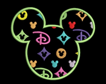 May include: Green outline of Mickey Mouse ears with a black background filled with a pattern of colorful Mickey Mouse heads, stars, and the Disney logo.