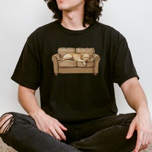 Comfort Colors t-shirt with yellow Labrador retriever sleeping on couch graphic design.
