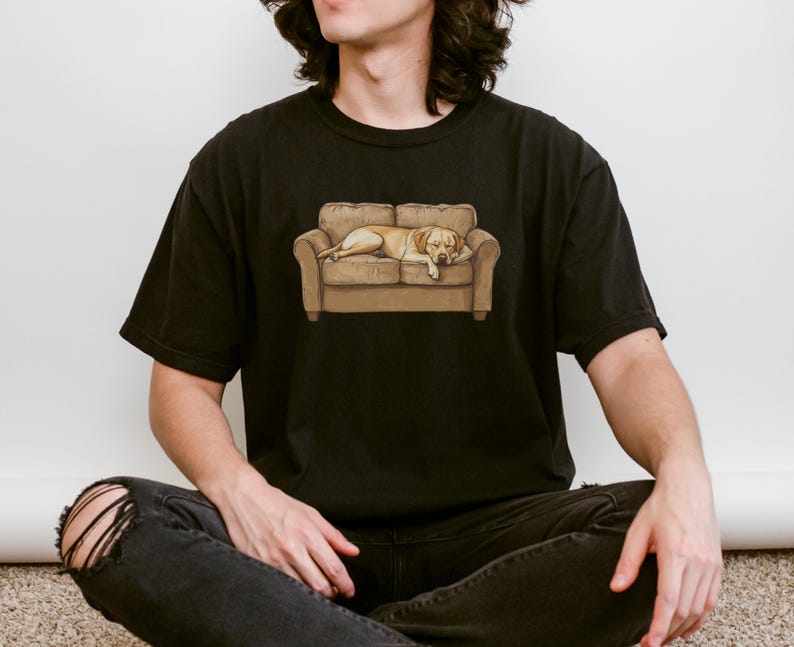 Comfort Colors t-shirt with yellow Labrador retriever sleeping on couch graphic design.