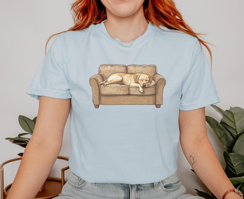 Comfort Colors t-shirt with yellow Labrador retriever sleeping on couch graphic design.