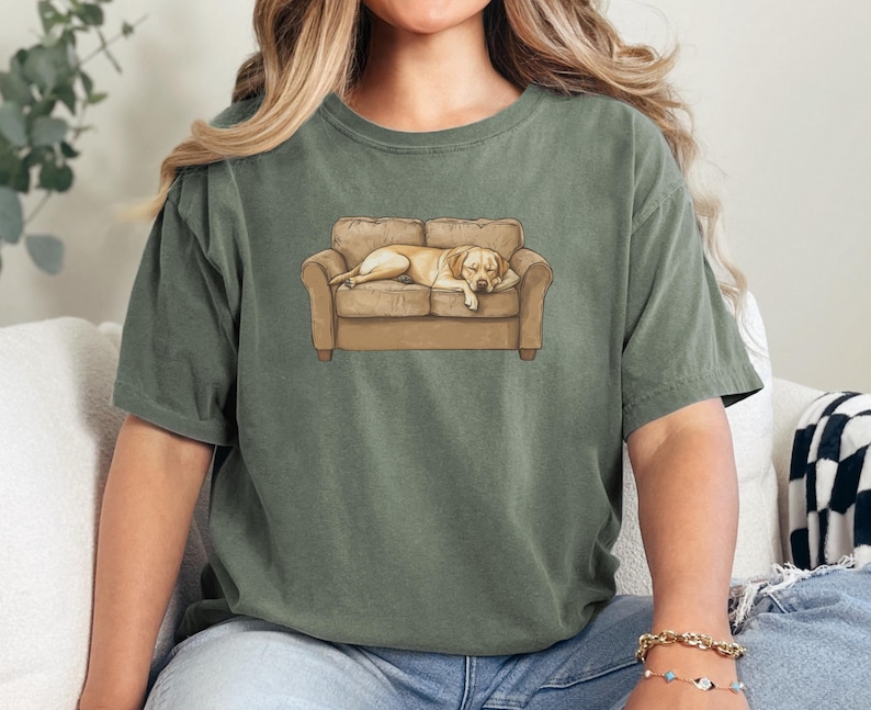 Comfort Colors t-shirt with yellow Labrador retriever sleeping on couch graphic design.