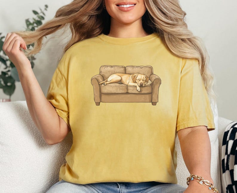 Comfort Colors t-shirt with yellow Labrador retriever sleeping on couch graphic design.