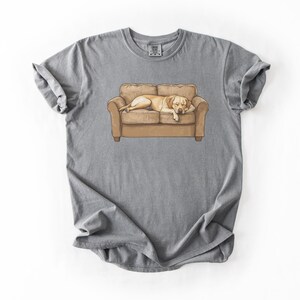 Comfort Colors t-shirt with yellow Labrador retriever sleeping on couch graphic design.