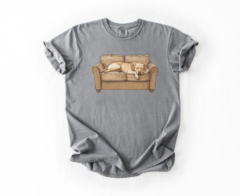 Comfort Colors t-shirt with yellow Labrador retriever sleeping on couch graphic design.