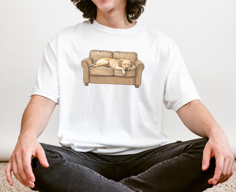 Comfort Colors t-shirt with yellow Labrador retriever sleeping on couch graphic design.