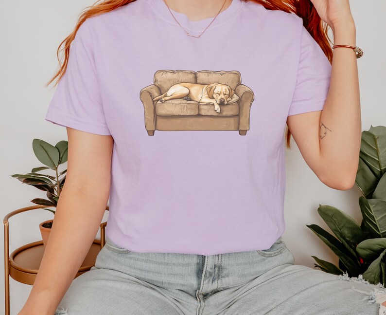 Comfort Colors t-shirt with yellow Labrador retriever sleeping on couch graphic design.