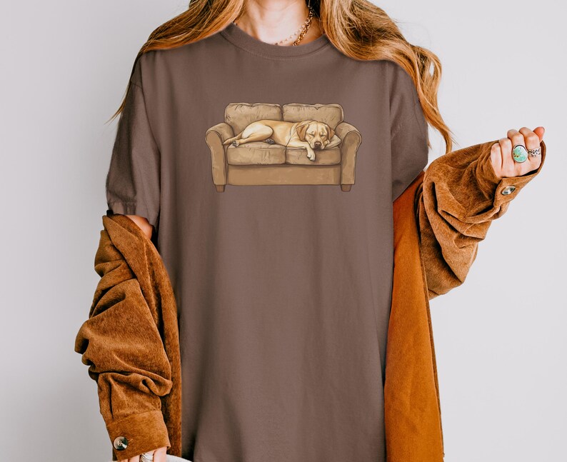 Comfort Colors t-shirt with yellow Labrador retriever sleeping on couch graphic design.