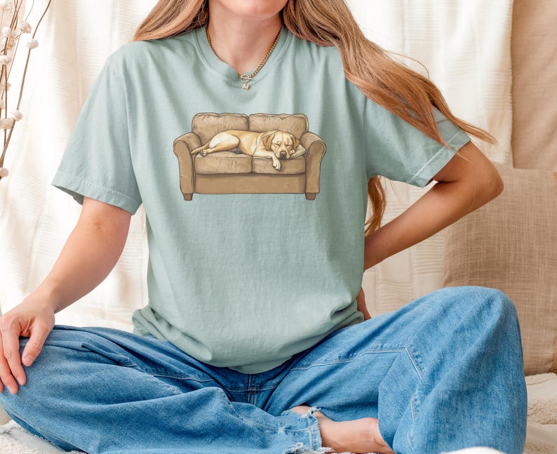 Comfort Colors t-shirt with yellow Labrador retriever sleeping on couch graphic design.