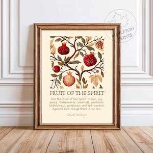 May include: A printable art print with a vintage botanical illustration of a pomegranate tree. The print features the text "Fruit of the Spirit" and a Bible verse from Galatians 5:22. The background is a cream color.