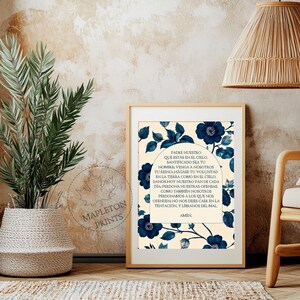 May include: A printable art print with a cream background and blue floral design. The print features the Lord's Prayer in Spanish, "Padre Nuestro".