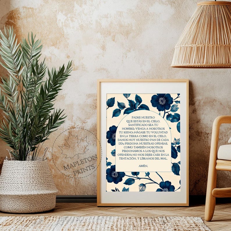 May include: A printable art print with a cream background and blue floral design. The print features the Lord's Prayer in Spanish, "Padre Nuestro".