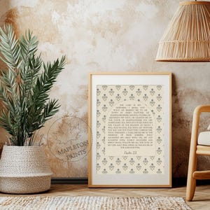 May include: A framed wall art print featuring the text of Psalm 23 centered within an arched design. The background displays a repeating pattern of small blue floral motifs on a cream-colored field. A circular watermark reads MAPLETON PRINTS.