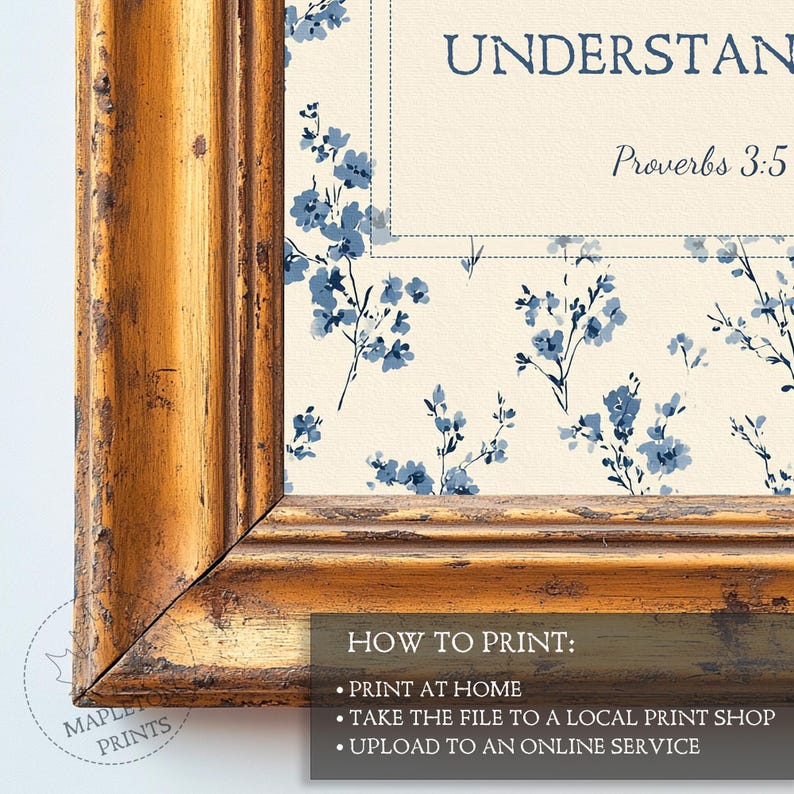 May include: A framed print with a floral design and the text "UNDERSTAND Proverbs 3:5". The print has a cream background with blue floral accents and is encased in a gold-colored wooden frame. The bottom of the frame has instructions on how to print the image.