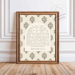 May include: A framed print with a cream background and a blue floral pattern. The print features a quote by Ralph Waldo Emerson about laughter, respect, and the appreciation of beauty. The quote reads: "To laugh often and much: to win the respect of intelligent people and the affection of children: to earn the appreciation of honest critics and endure the betrayal of false friends; to appreciate beauty; to find the best in others, to leave the world a bit better, whether by a healthy child, a garden patch, or a redeemed social condition to know even one life has breathed easier because you have lived. This is to have succeeded." - Ralph Waldo Emerson
