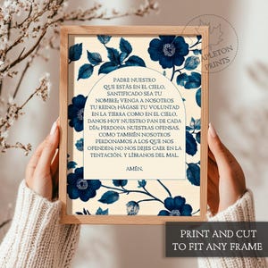 May include: A printable art print with a cream background and blue floral design. The print features the Lord's Prayer in Spanish, "Padre Nuestro", with a decorative arch above the text.