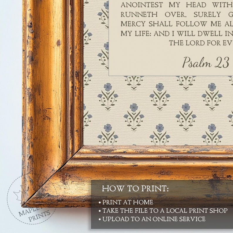 May include: A framed wall art piece featuring a cream-colored background with a repeating pattern of small blue flowers and green stems. The text reads Psalm 23 and includes verses from the Bible. The frame is gold with a distressed, weathered finish.