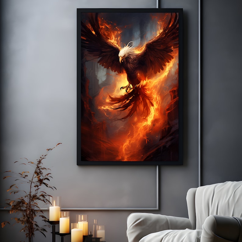 May include: A framed artwork depicts a phoenix in flight, rendered in fiery hues of orange, red, and brown. The mythical bird has outstretched wings and a white head, set against a dark, smoky background. The artwork is displayed on a gray wall.