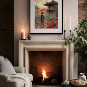 May include: A framed print depicting a woman in a traditional Japanese kimono walking through a garden with a red umbrella. The garden features a pagoda in the background and red flowers.