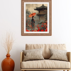 May include: A framed print depicting a woman in a traditional Japanese kimono holding a red umbrella, standing in a garden with a pagoda in the background. The garden is filled with red flowers and the sky is a soft grey.