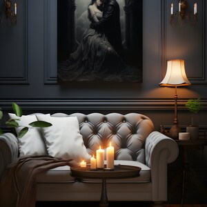 May include: A white leather sofa with two pillows and a brown throw blanket. A small round table with four lit candles sits in front of the sofa. A painting of a couple embracing under a moonlit archway hangs on the wall behind the sofa.