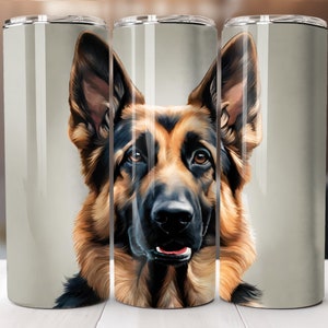 May include: Three stainless steel tumblers with a close-up image of a German Shepherd dog's face. The dog has brown and black fur and is looking directly at the camera.
