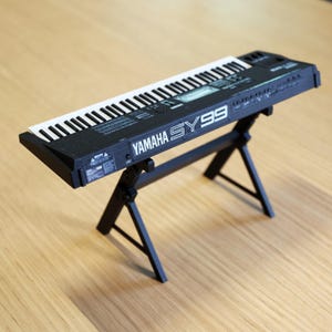 Miniature Yamaha SY99 Synthesizer: 1/6 Scale Collectible with Flightcase