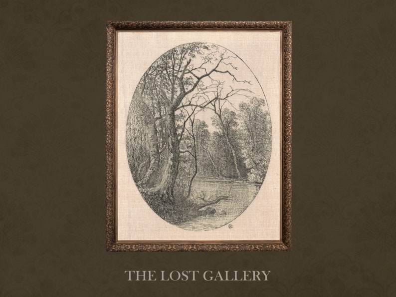 May include: A black and white engraving of a forest scene with trees and a river. The engraving is framed in a gold frame with an oval-shaped mat.