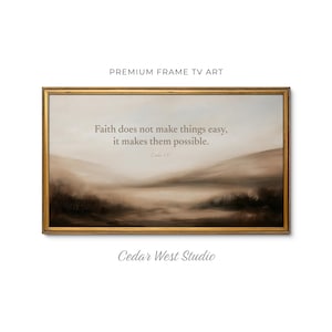 May include: A rectangular wall art piece in a gold frame featuring a landscape painting in muted brown and beige tones. The text reads: Faith does not make things easy, it makes them possible. Luke 1:37. The words Premium Frame TV Art appear above.