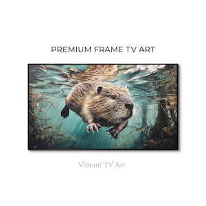 Op de afbeelding: Een ingelijste kunstdruk met een gedetailleerde illustratie van een bever die onder water zwemt. De bever heeft bruine vacht en wordt omringd door waterplanten en een blauwgroene wateromgeving. De tekst luidt "PREMIUM FRAME TV ART" en "Vibrant TV Art".