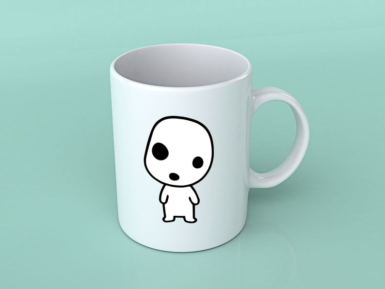 May include: White ceramic mug with a black and white cartoon character illustration. The character has a round head, two large eyes, and a small mouth.
