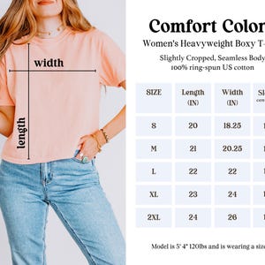 May include: A peach-colored, boxy t-shirt is shown with a size chart. The chart details the length, width, and sleeve measurements in inches for sizes S through 2XL. The shirt is made of 100% ring-spun US cotton.