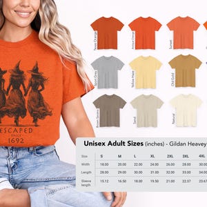 May include: An antique orange t-shirt featuring a black graphic of three witches holding hands with the text ESCAPED SINCE 1692. A size chart for Gildan Heavy Cotton tees is visible, listing widths from 18.00 to 32.00 inches and lengths from 28.00 to 35.00 inches.