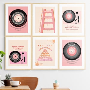 May include: Six framed prints with pink backgrounds and black and white illustrations of different psychological theories. The prints feature the text "Zone of Proximal Development", "Ecological Systems Theory", "Maslow's Hierarchy of Needs", "Vygotsky", "Bronfenbrenner", and "What I Can Do With Help".