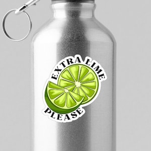 May include: A silver water bottle with a black carabiner lid and a white sticker that says "Extra Lime Please" with a lime wedge graphic.