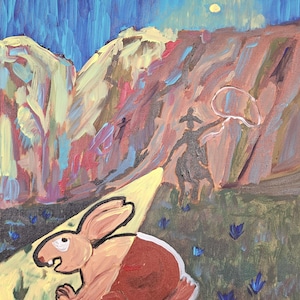 May include: An acrylic painting on canvas depicting a brown rabbit in the foreground on a yellow path. In the background, a dark silhouette of a person on horseback swings a lasso against a backdrop of reddish-brown cliffs under a blue sky.