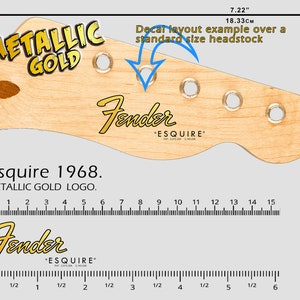 Może przedstawiać: Przykład układu kalkomanii główki gitary z metalicznym złotym logo Fender Esquire 1968. Główka ma szerokość 18,33 cm (7,22 cala). Kalkomania jest pokazana na główce o standardowym rozmiarze.