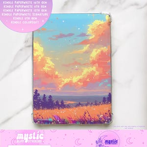 May include: A clear Kindle case featuring a vibrant landscape design with a sunset sky, fields, and trees. The case is compatible with various Kindle models, as indicated by the text on the image. The case is from Mystic Bluu Stickers.