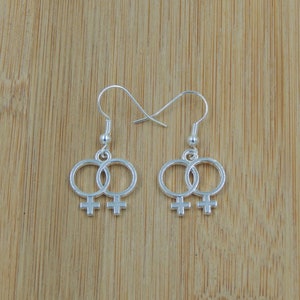 Double venus earrings sale