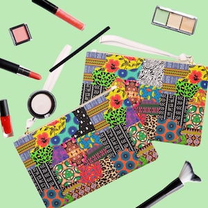 May include: Two colorful patchwork fabric zippered pouches with a white zipper pull. The pouches are made of a variety of fabrics with geometric and floral patterns in bright colors like red, green, blue, yellow, and black.