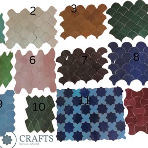May include: A collection of twelve Moroccan tile samples in various shapes and colors. The tiles include shades of green, beige, brown, dark green, pink, dark brown, blue, and red. The image also includes the logo "CRAFTS Morocco crafts USA."