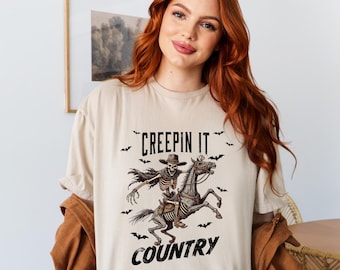 Halloween Creepin It Country Tshirt, Western Skeleton Shirt, Western Halloween Sweatshirt, Howdy Halloween Shirts, Pumpkin Cowboy Sweatshirt