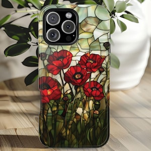 Pu&ograve; includere: Una custodia per telefono con un design in vetro colorato con papaveri rossi su uno sfondo verde.