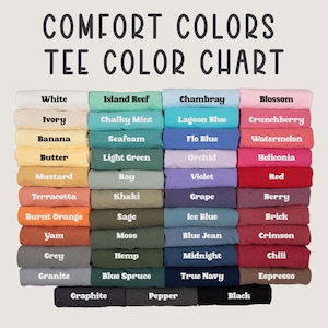 May include: A color chart for Comfort Colors t-shirts. The chart displays a variety of folded t-shirts in various colors, including white, blue, pink, green, and orange. The text "COMFORT COLORS TEE COLOR CHART" is at the top.