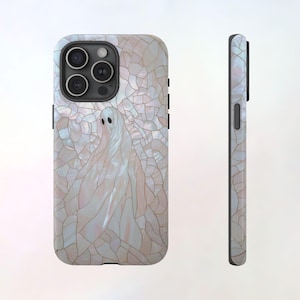 May include: A white iPhone case with a ghost design on a pearlescent background. The case has a mosaic pattern and a black border.